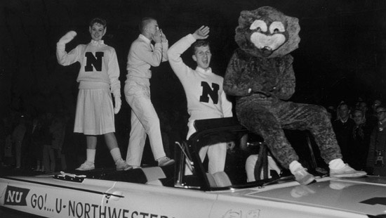 1960 - Decades after his appearance on the sidelines, Willie the Wildcat rides in a Homecoming parade. Northwestern athletes were first called "wildcats" after a 1924 game against the University of Chicago.