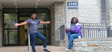 Resident Assistants at res hall entrance