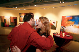 A warm welcome at the 20th-reunion party at the Maple Avenue Gallery in Evanston